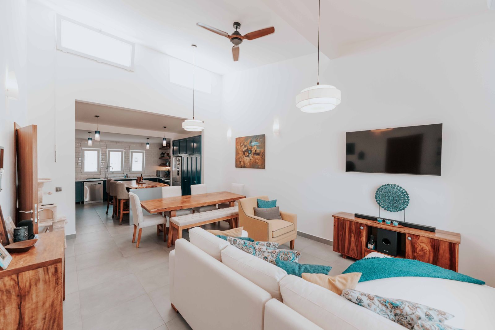 Stylish open-concept living area with modern design and furniture